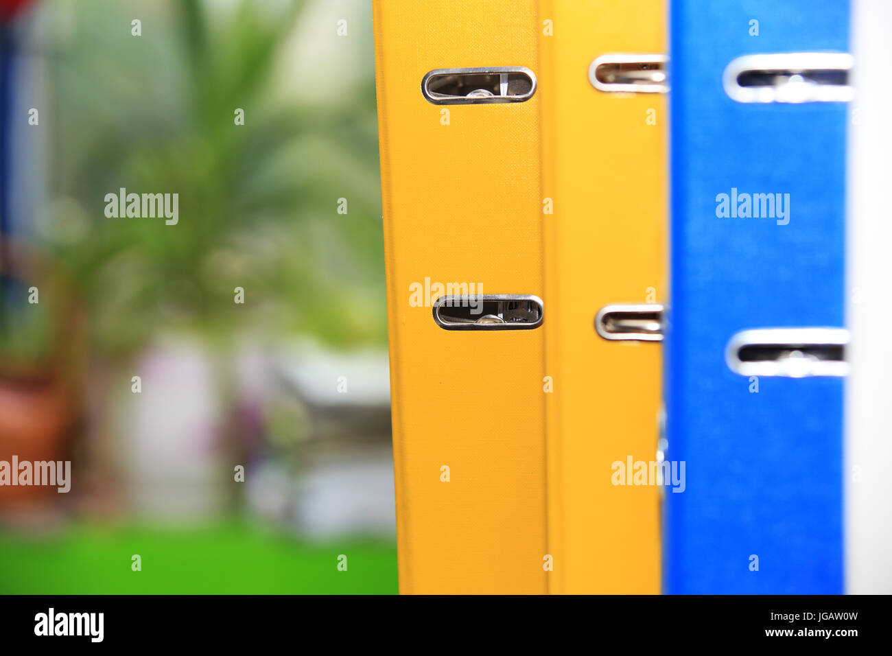 Group of colorful folders close-up. Folders for documents in office. Stock Photo
