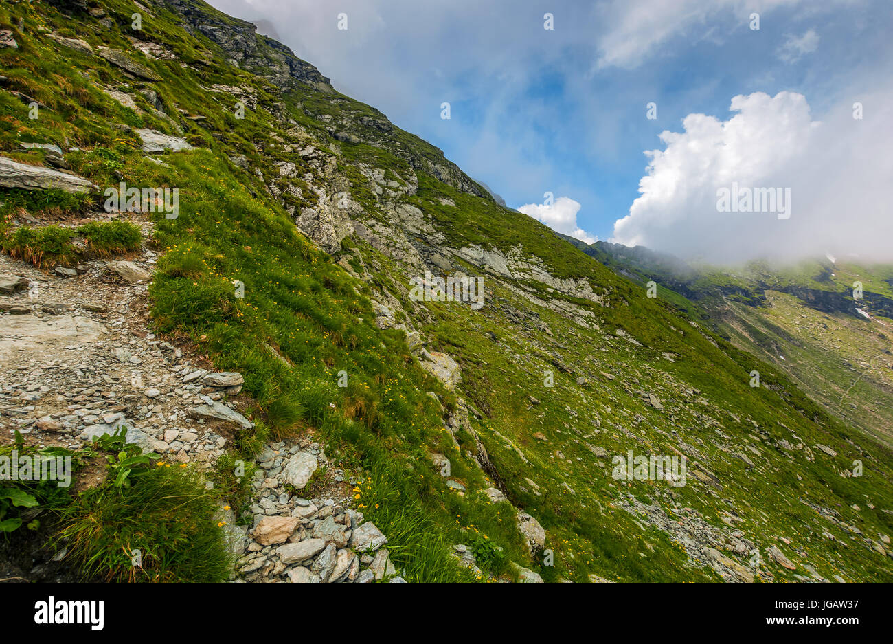 Edge Of Steep Slope On Rocky Hillside In Foggy Weather. Dramatic Scenery In  Mountains Stock Photo, Picture and Royalty Free Image. Image 81557891.