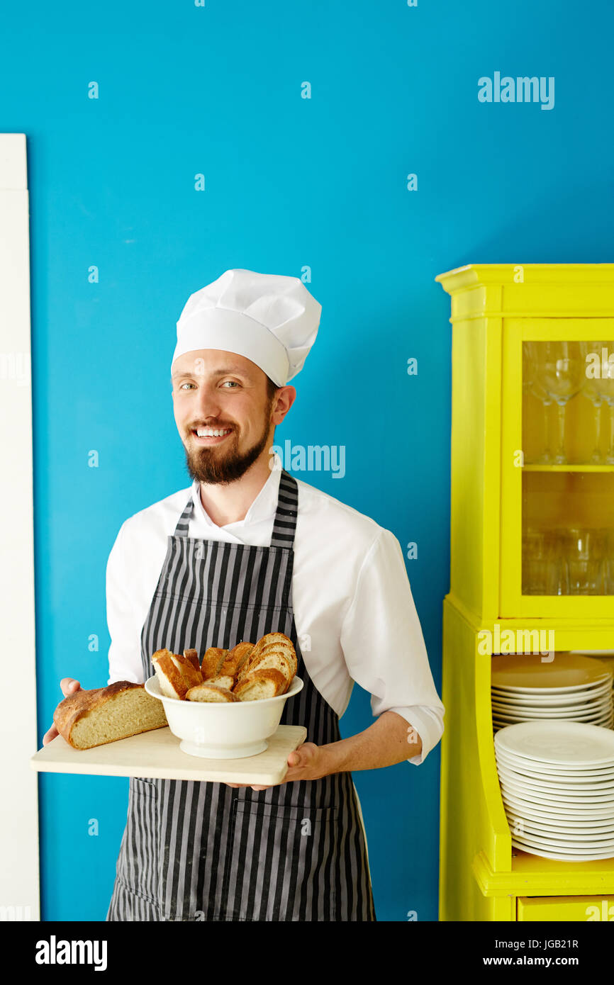 Baker in the kitchen Stock Photo Alamy