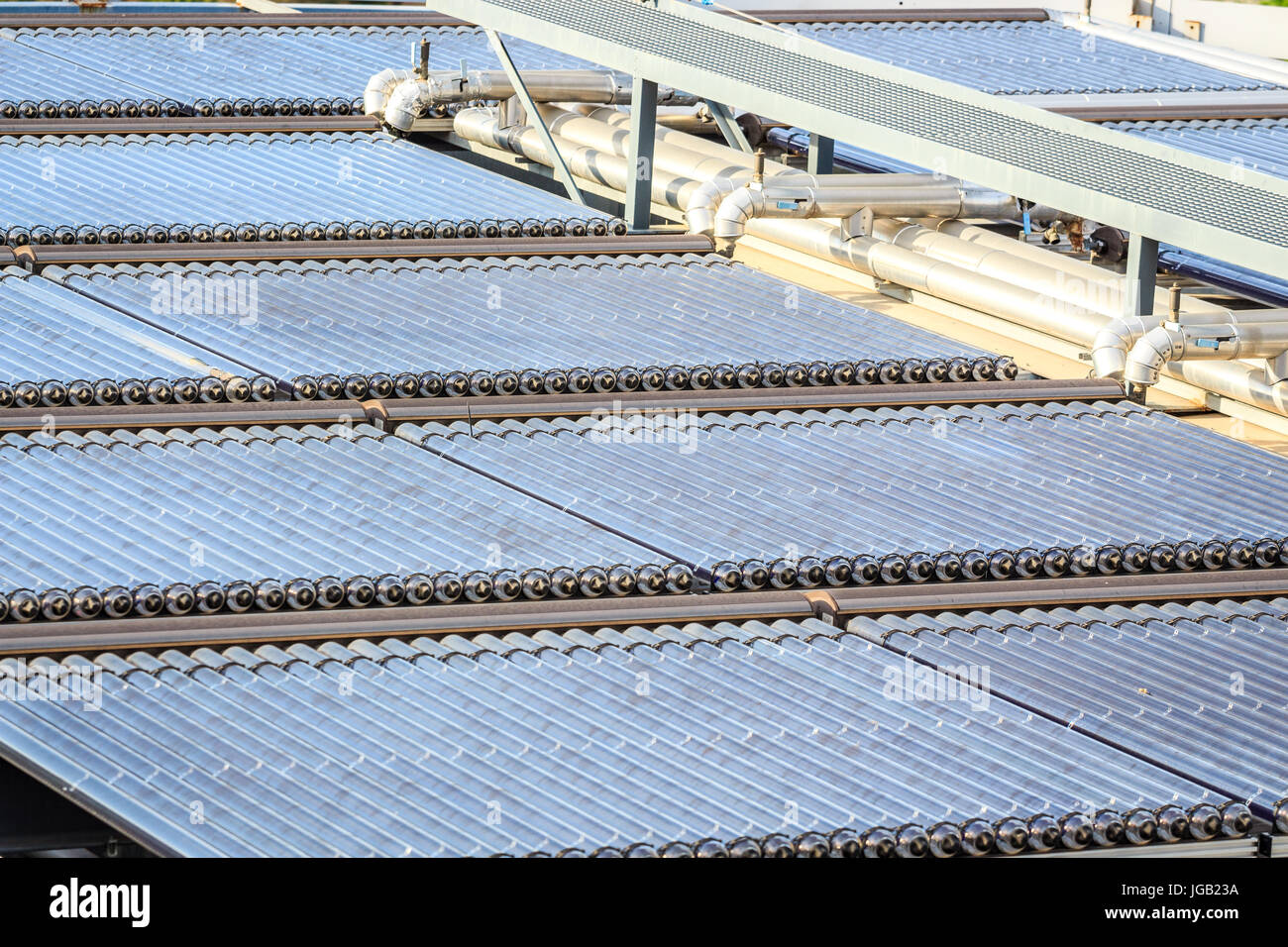 Water solar panels installed on flat roof Stock Photo