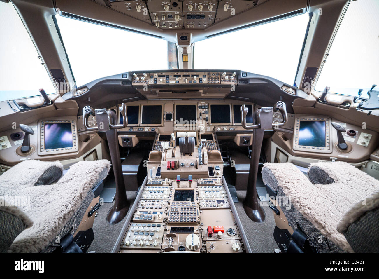 Flight deck in regular airplane. Copy space behind windows. Stock Photo