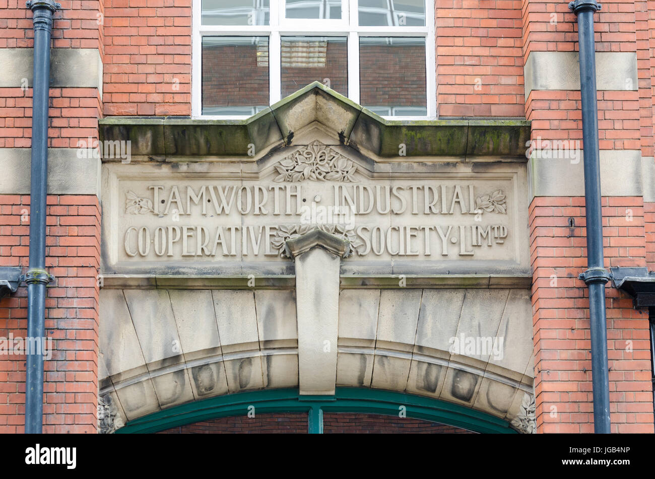 Sign for Tamworth Industrial Co-Operative Society Limited above entrance to building in Tamworth Stock Photo