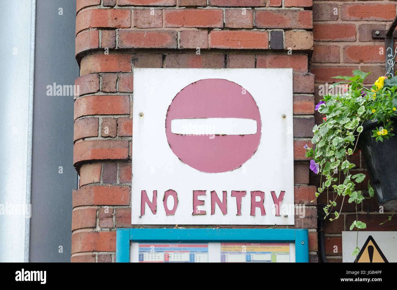 Old 'No Entry' sign with peeling paint Stock Photo
