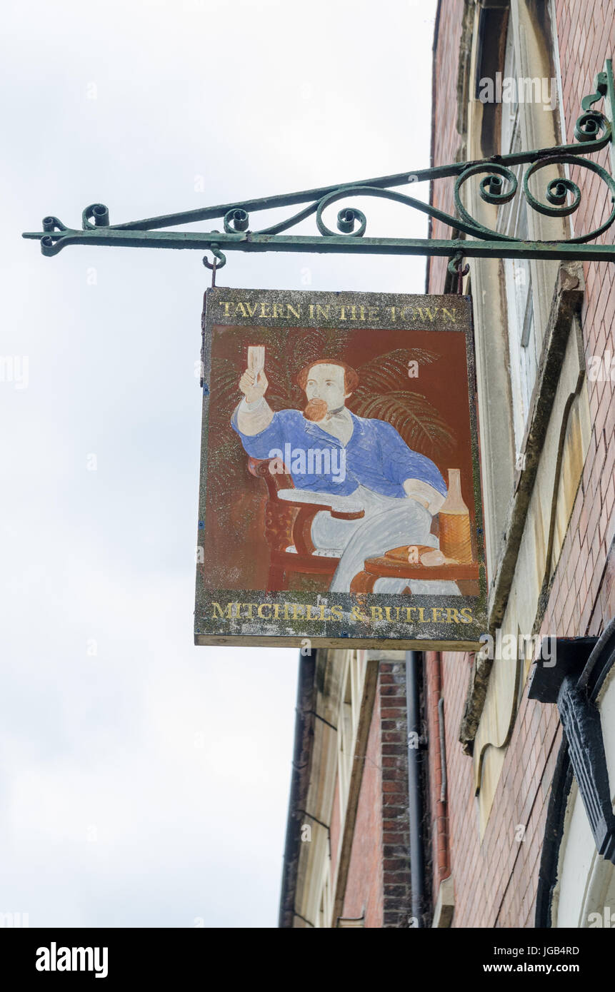 Old faded pub sign for the Tavern In The Town in Tamworth, Staffordshire Stock Photo