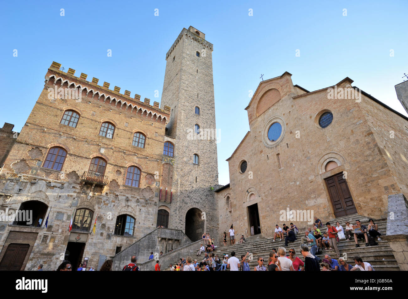Palazzo del Popolo and cathedral, Piazza del Duomo, San Gimignano, Tuscany, Italy Stock Photo