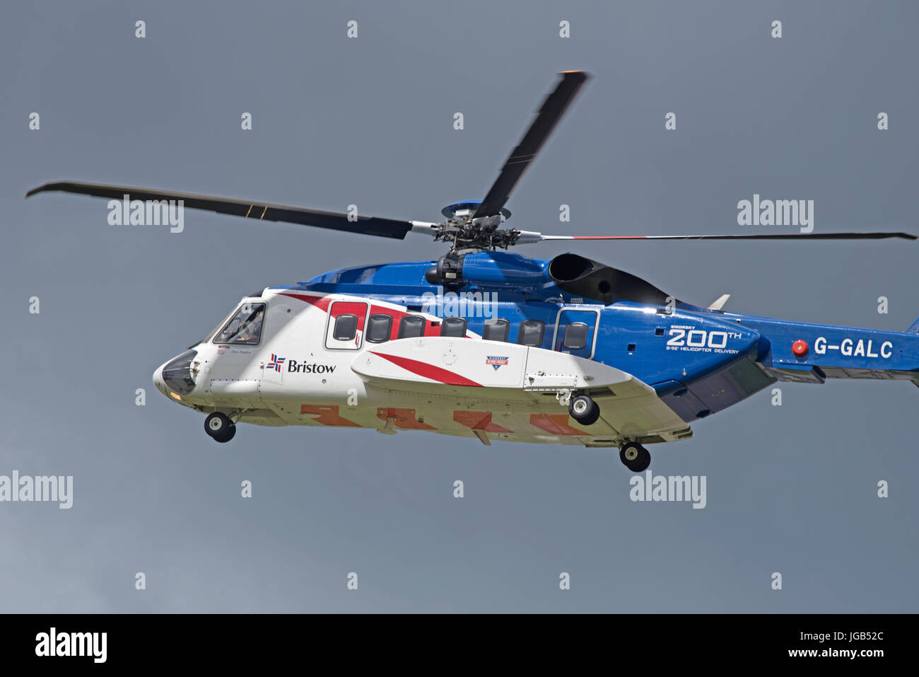 Bristols S92A helicopter on training flight over Inverness airport in Highland Region in the Scottish Highlands. UK. Stock Photo