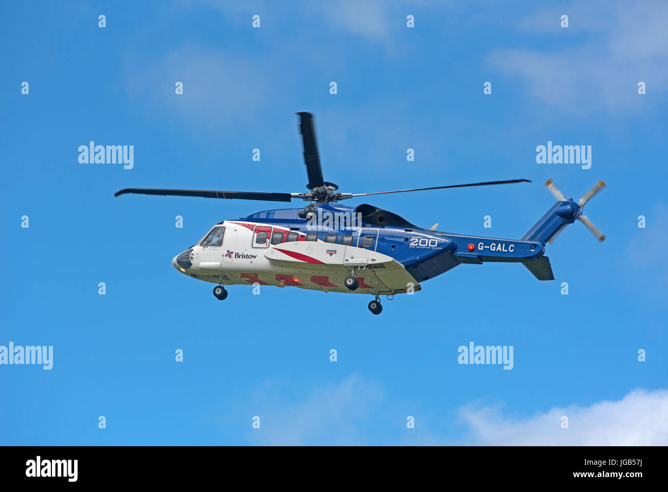 Bristols S92A helicopter on training flight over Inverness airport in Highland Region in the Scottish Highlands. UK. Stock Photo