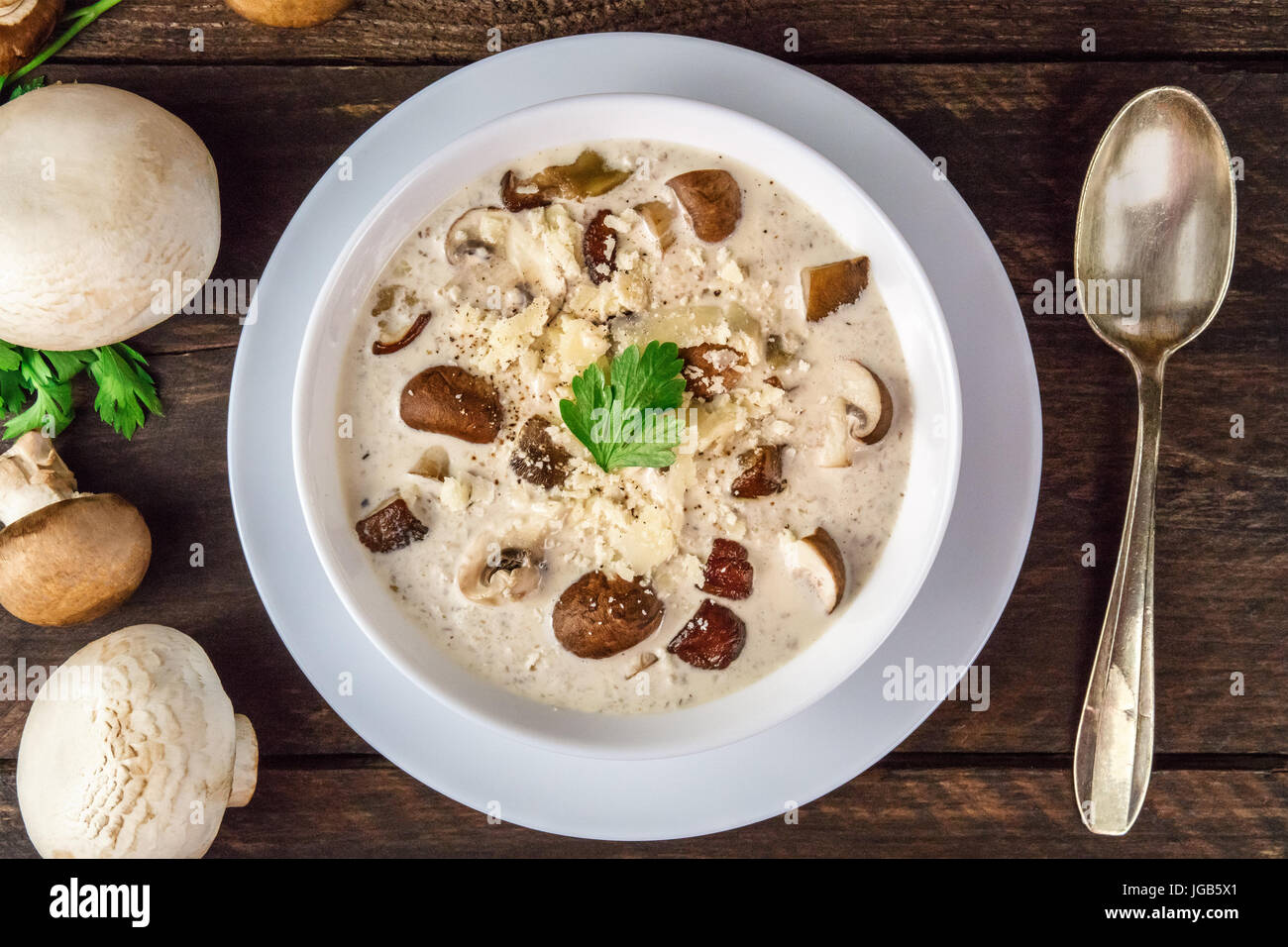 Plate of mushroom soup with champignons, cremini, and parsley Stock Photo Alamy
