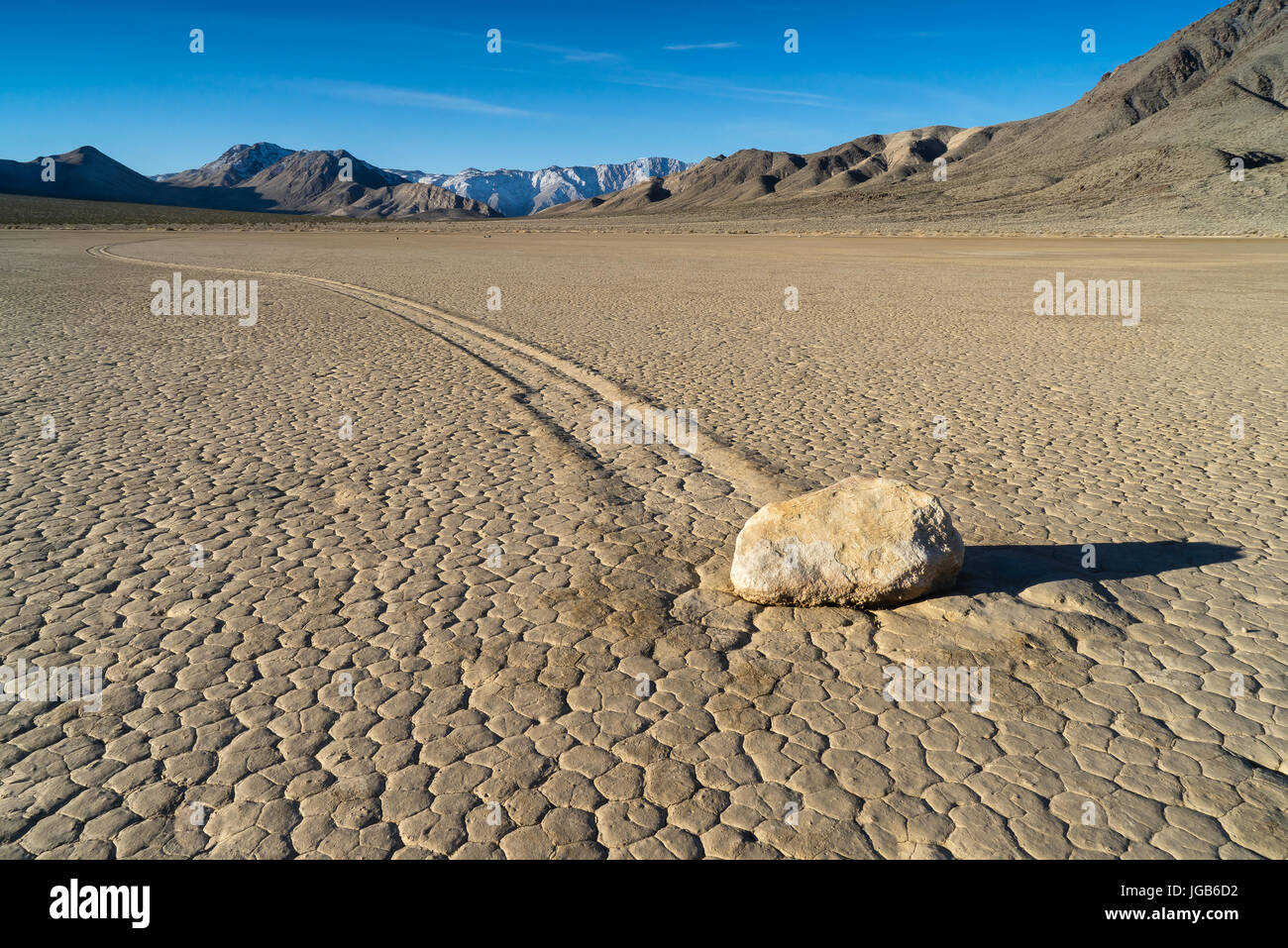 The Racetrack Playa, or The Racetrack, is a scenic dry lake feature with 'sailing stones' that inscribe linear 'racetrack' imprints. It is located abo Stock Photo