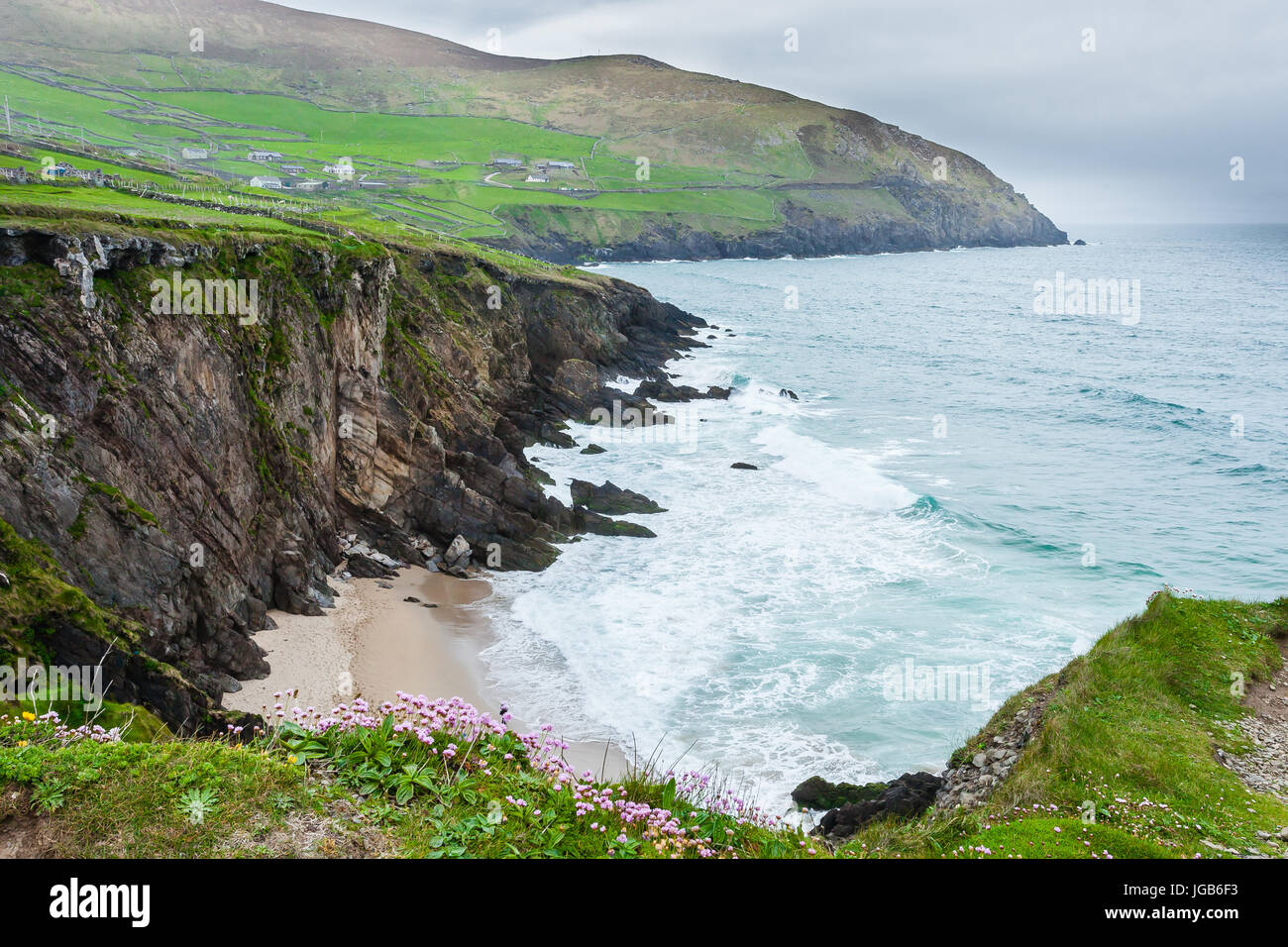 Slea Head (Irish: Ceann Sléibhe) is a promontory in the westernmost part of the Dingle Peninsula, located in the barony of Corca Dhuibhne in southwest Stock Photo