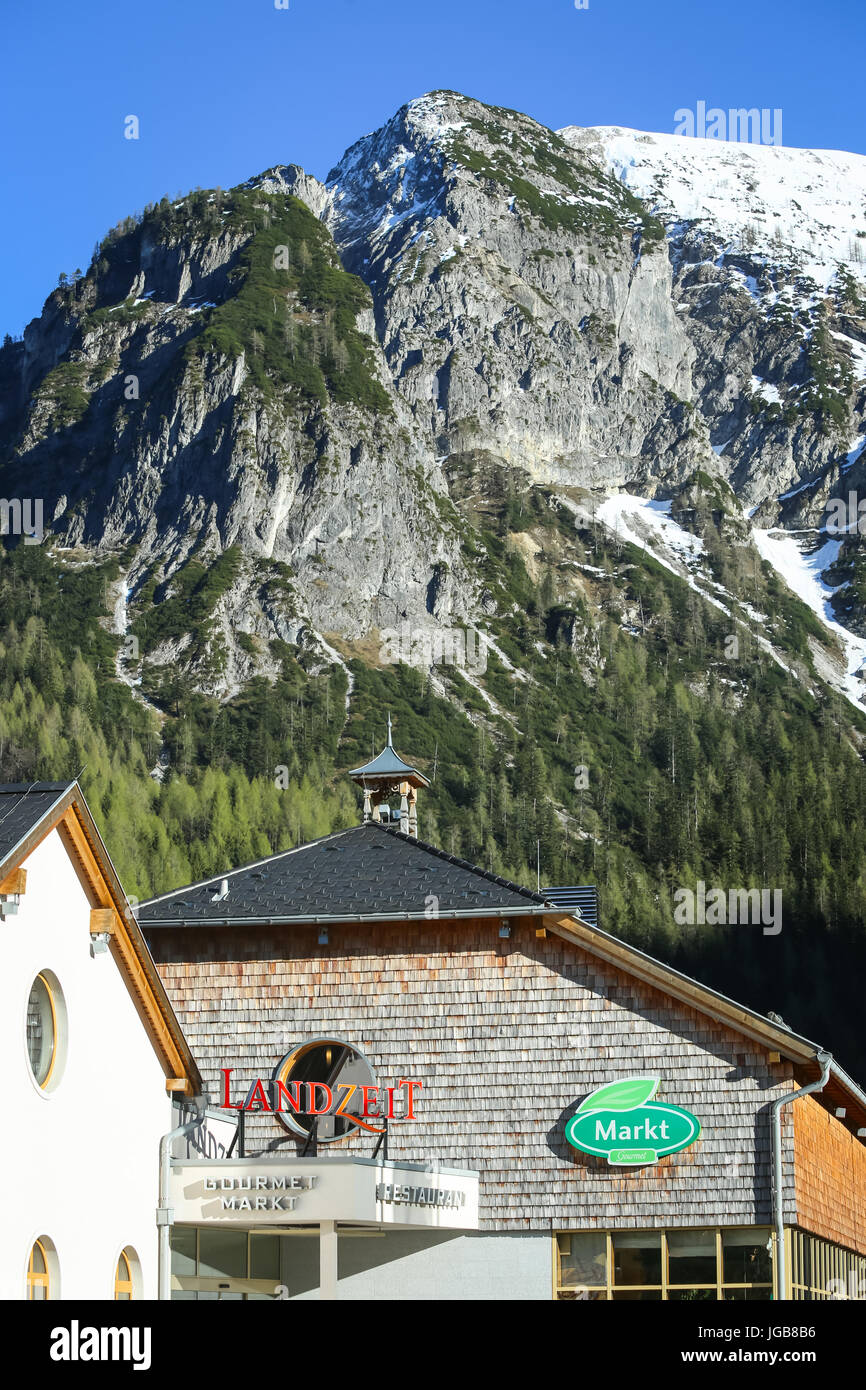 FLACHAU, AUSTRIA - MAY 10, 2017 : View of the top of Landzeit Tauernalm hotel and restaurant in Alps environment in Flachau, Austria. Stock Photo