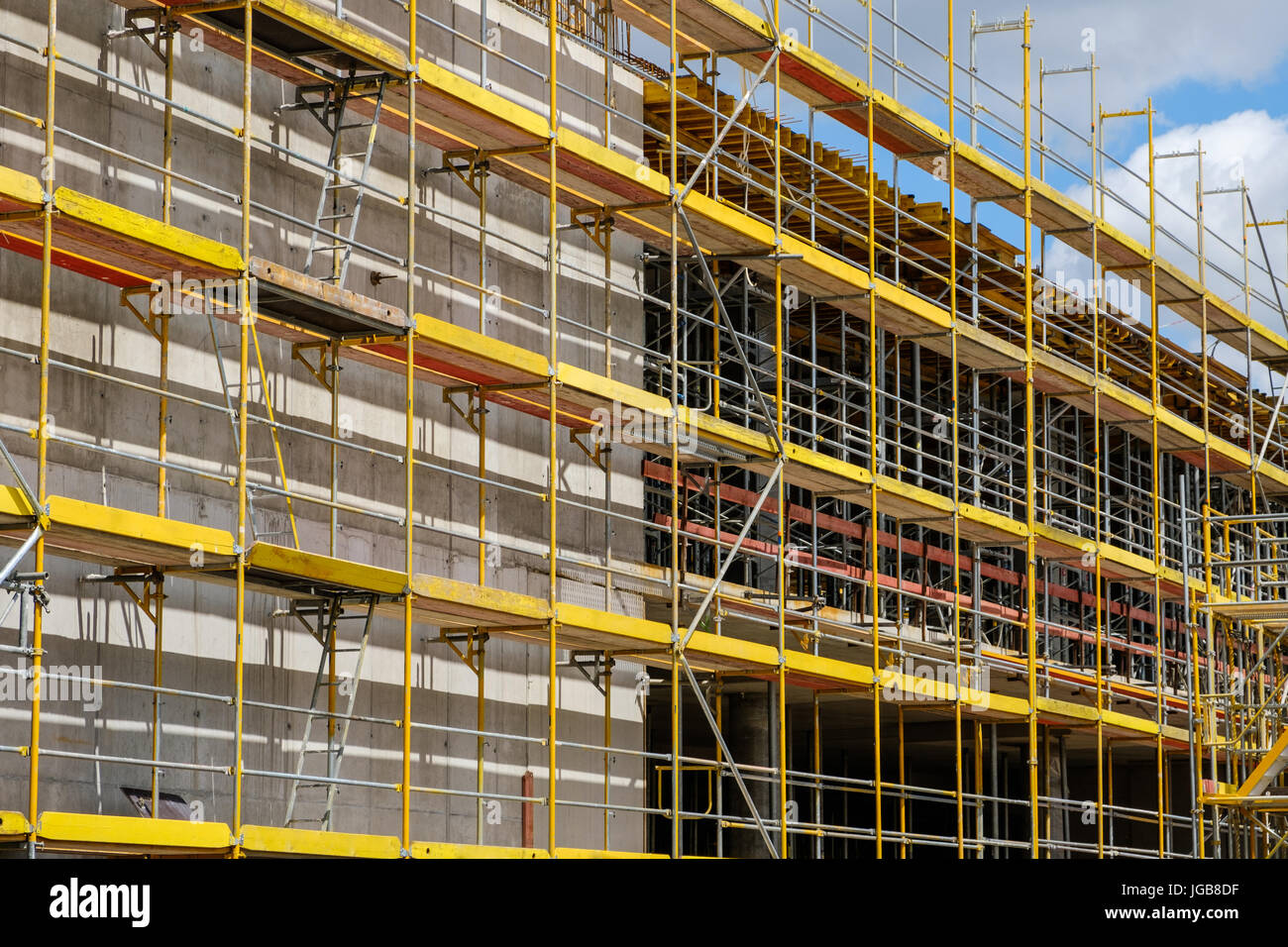 scaffolding on building facade , construction site with framework on buiding Stock Photo Alamy