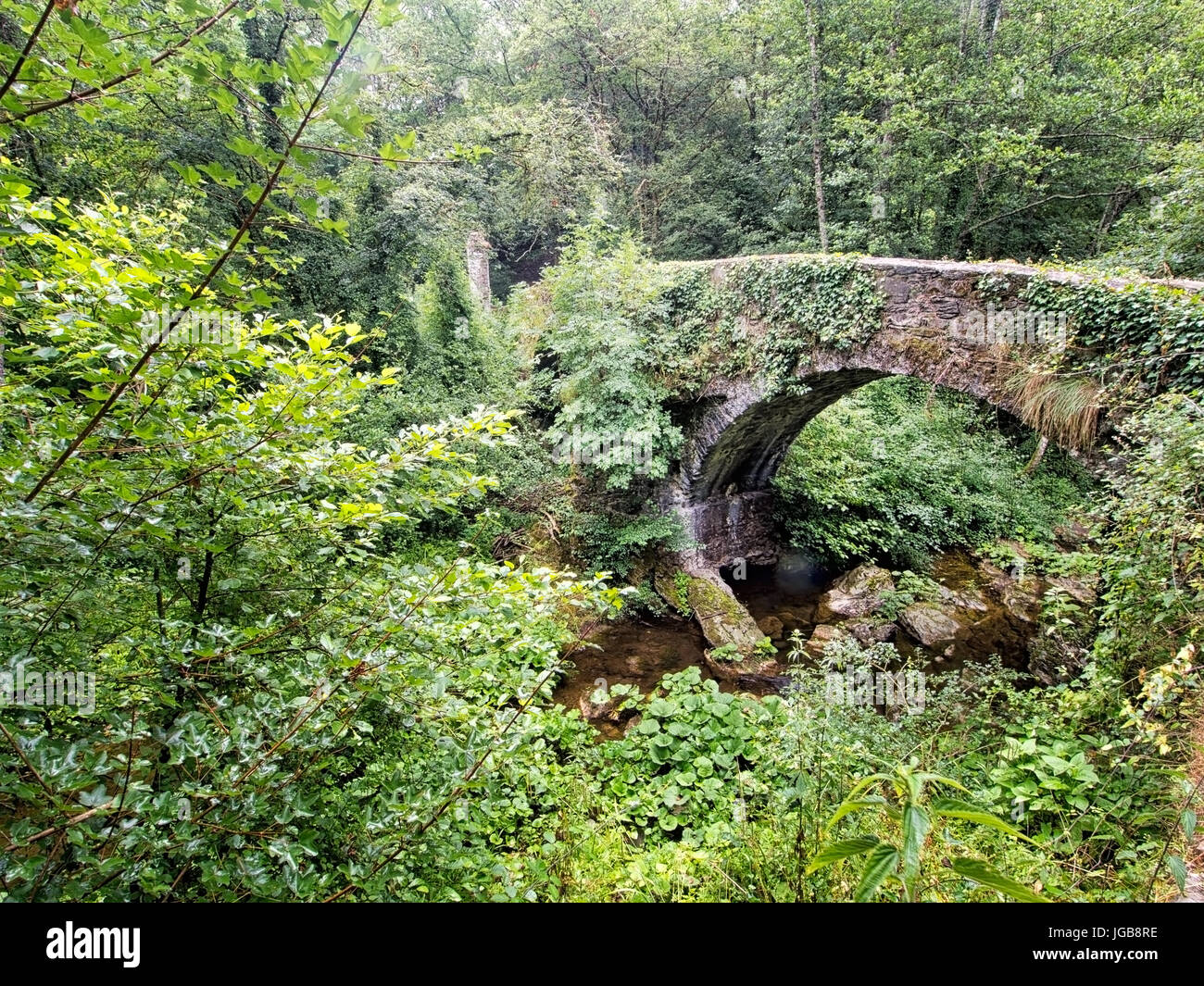 Ancient Roman bridge at Fornoli in Lunigiana, Italy. On the Via Francigena. Stock Photo