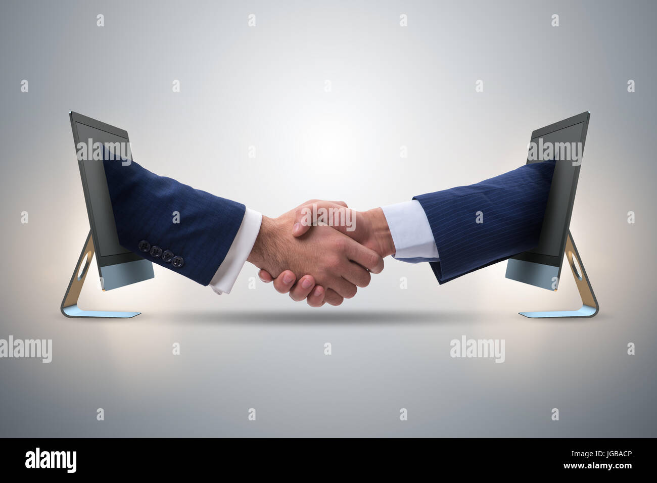 Computer Screen Handshake Two hands from screen in handshake concept Stock Photo - Alamy