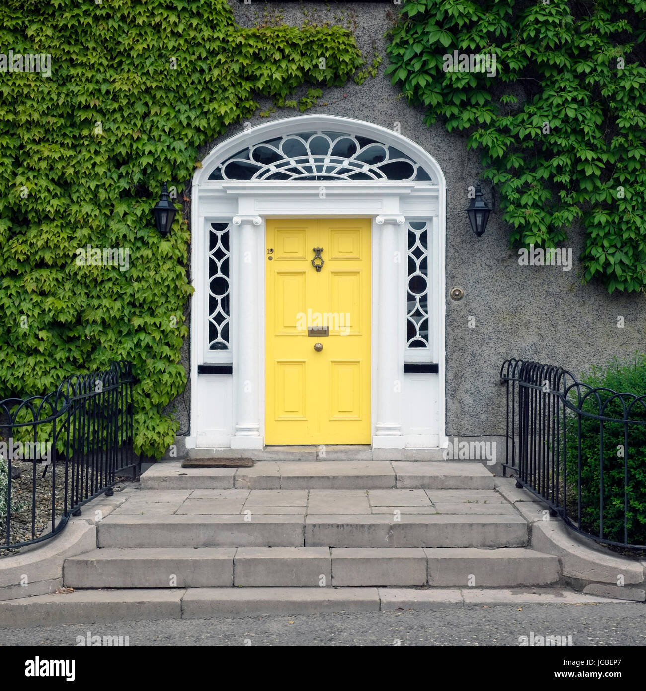 Yellow door in Loughgall, County Tyrone, Northern Ireland Stock Photo