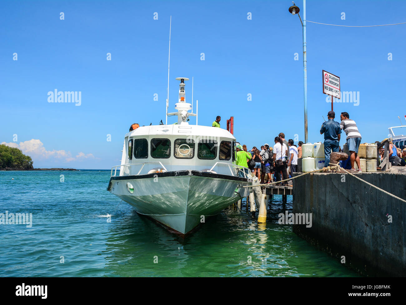 Bali, Indonesia - Apr 19, 2016. Passengers coming to the ferry in Bali Island, Indonesia. Bali is part of the Coral Triangle, the area with the highes Stock Photo