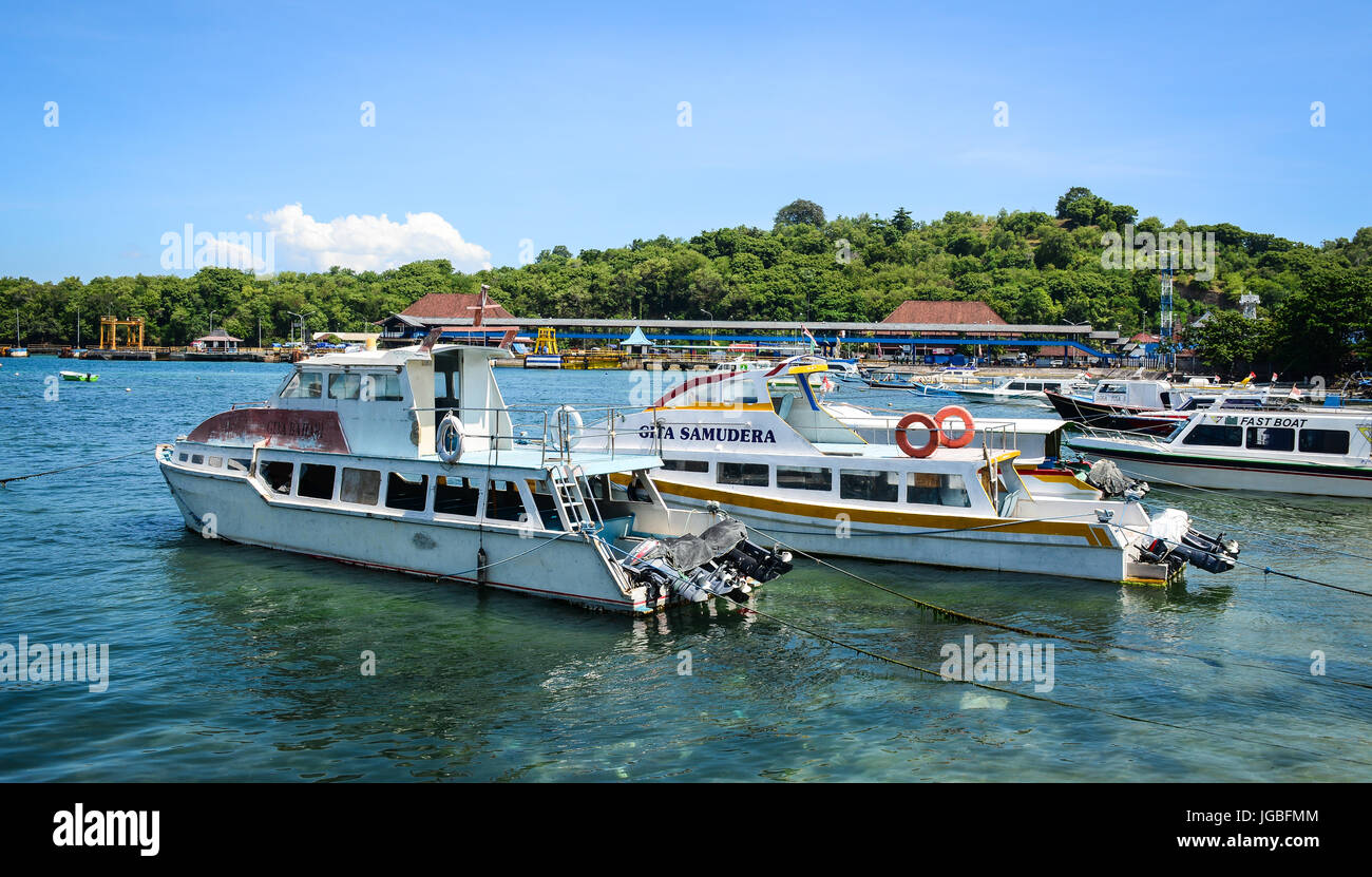 Bali, Indonesia - Apr 19, 2016. Tourist boats docking at jetty in Bali Island, Indonesia. Bali is part of the Coral Triangle, the area with the highes Stock Photo