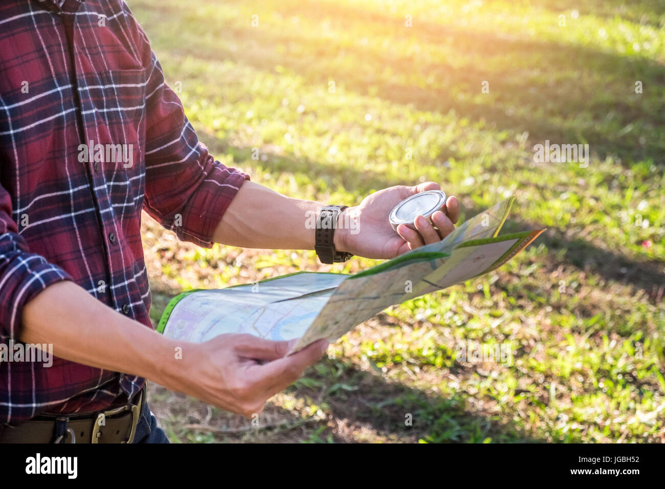 Female hiker map compass hi-res stock photography and images - Alamy