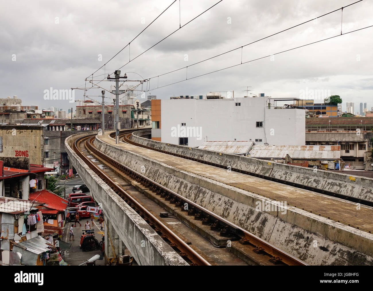 Manila, Philippines - Dec 20, 2015. Skytrain track at EDSA train station in Manila, Philippines. LRT serves 579,000 passengers each day. Stock Photo