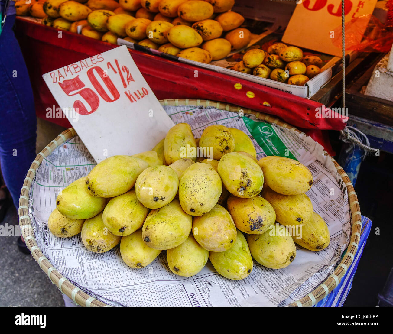 Manila, Philippines Apr 12, 2017. Selling yellow mangoes at market in