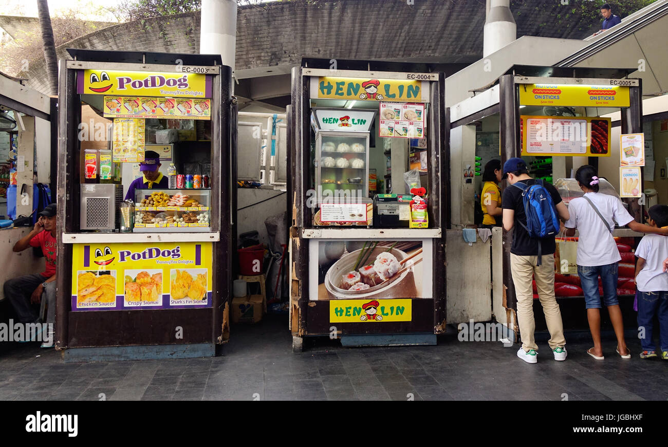 Manila, Philippines - Dec 21, 2015. Selling street food at market in