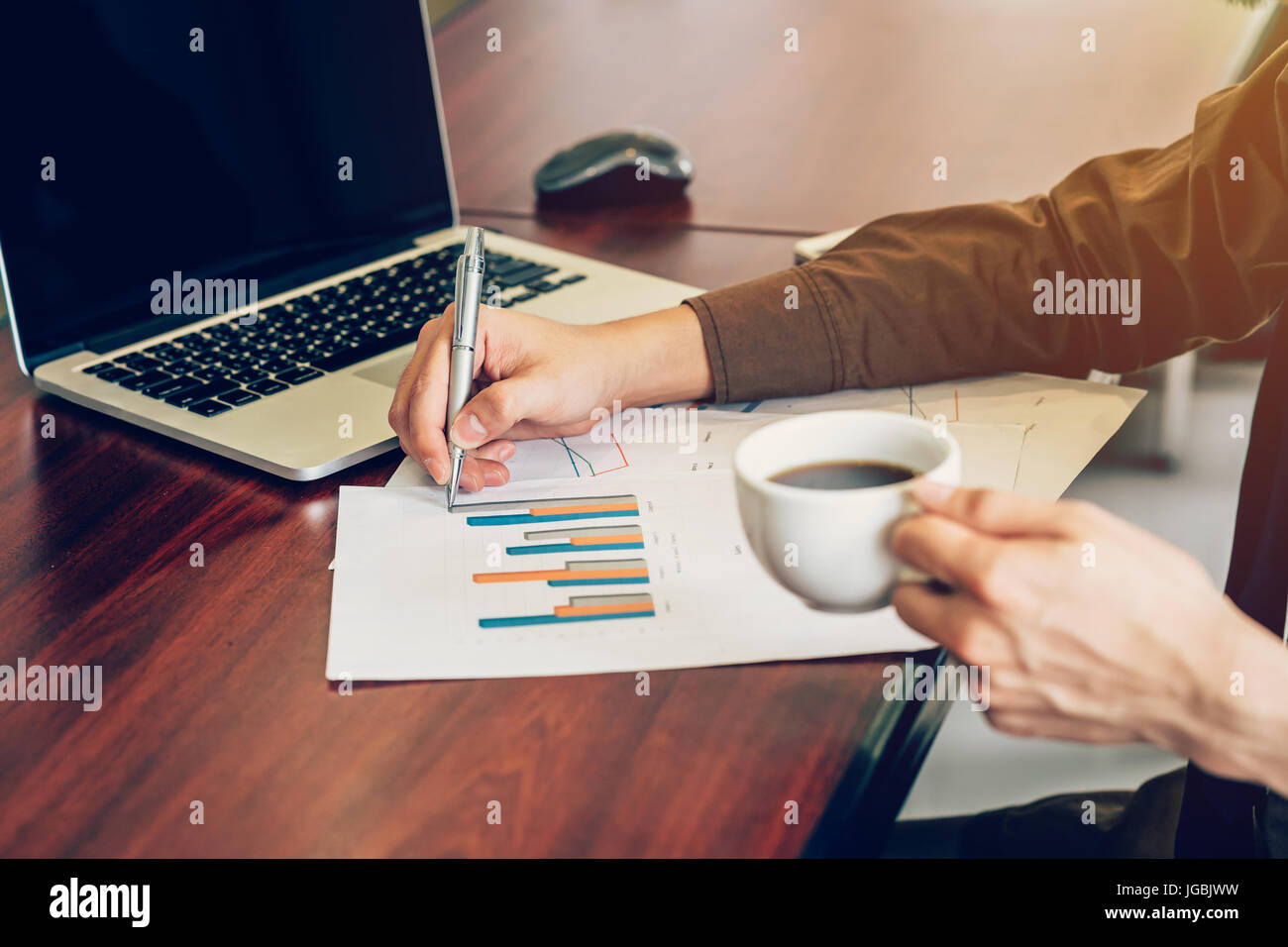 business man writing paper sheet on wood table in office Stock Photo ...
