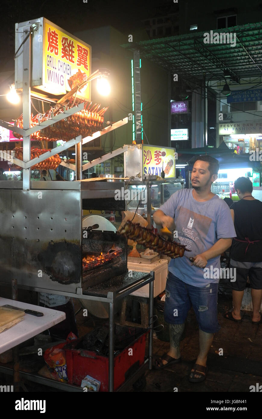 Grilled chicken wings stall at the Jalan Alor night market in Kuala