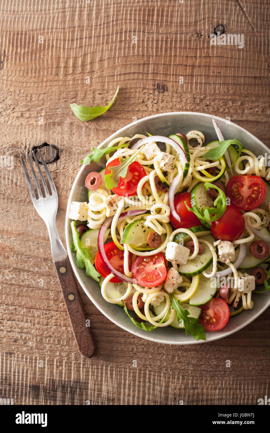 spiralized courgette salad greek style with tomato feta olives cucumber Stock Photo