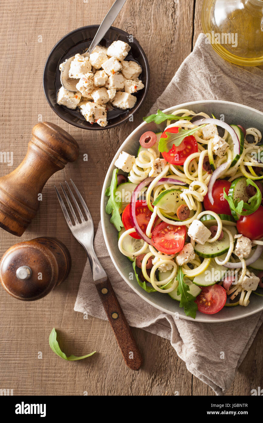 spiralized courgette salad greek style with tomato feta olives cucumber Stock Photo