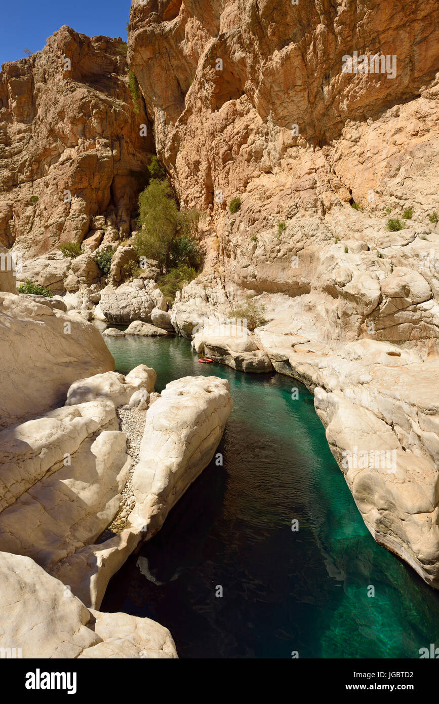Water pools of oasis Wadi Bani Khalid, Al Hajar ash Sharqi mountains, Sharqiyah, Oman Stock Photo