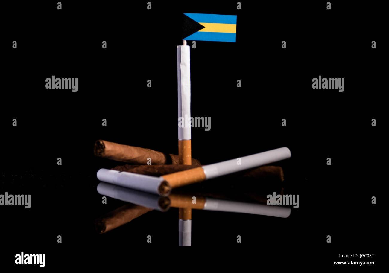 how much are cigarettes in bahamas Bahamas flag with cigarettes and cigars. Tobacco Industry concept Stock  Photo