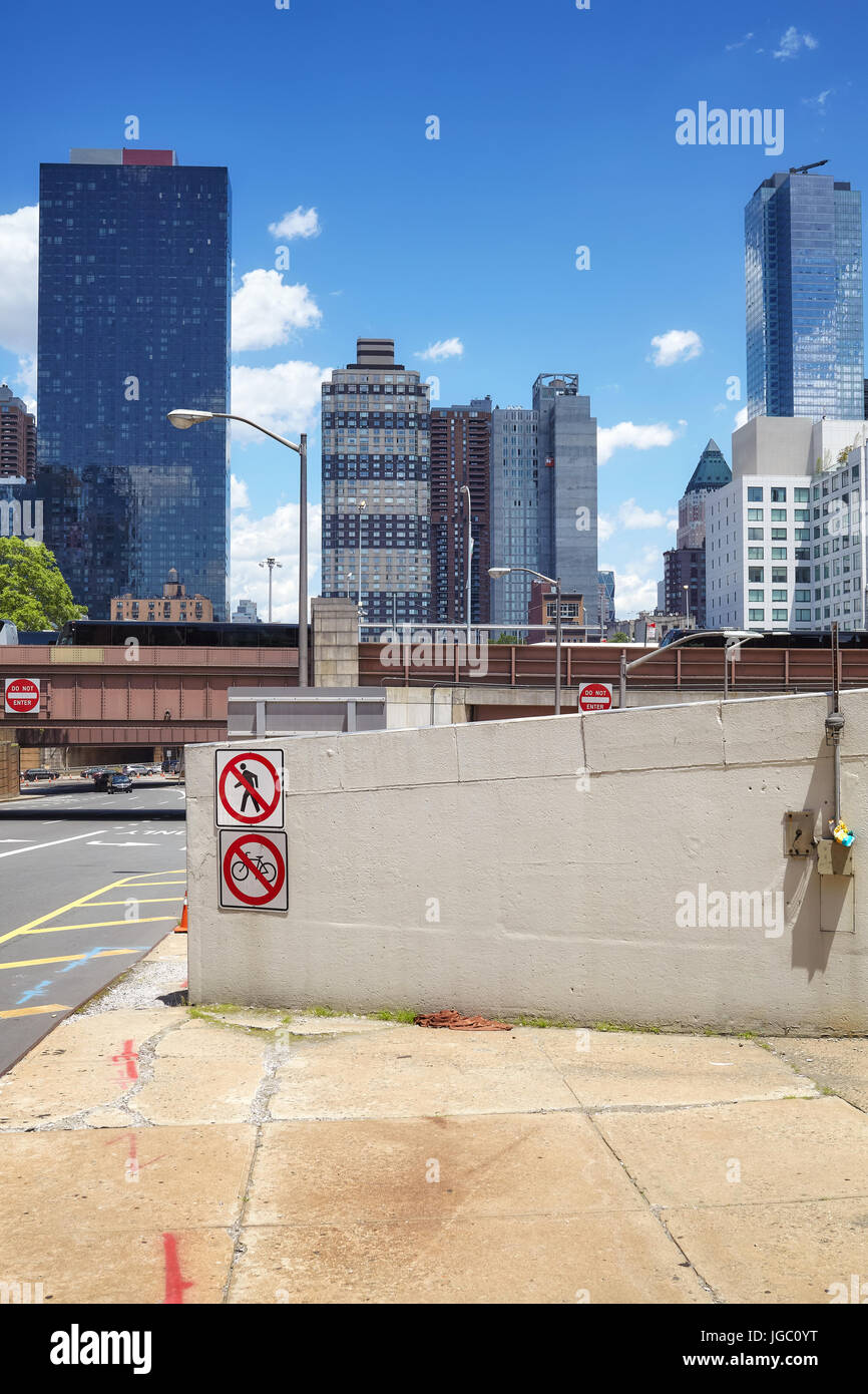 Street of New York City with traffic signs, USA. Stock Photo