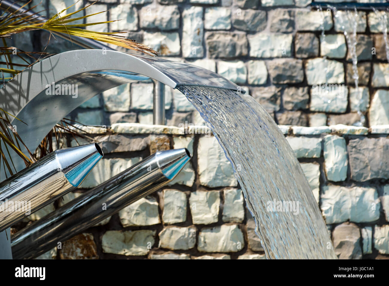 Swimming pool with fountain at hotel close up Stock Photo Alamy