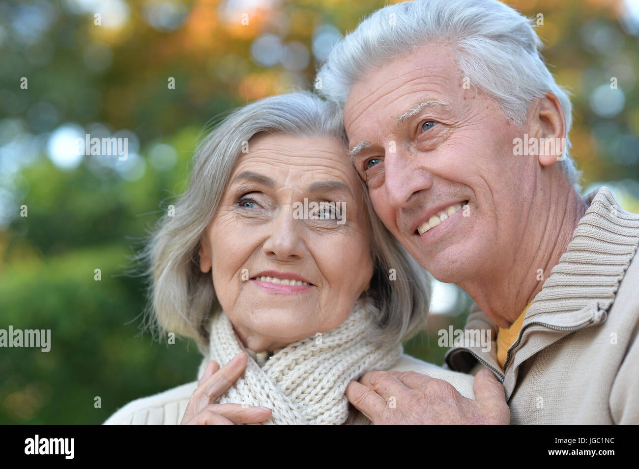 senior couple posing in the park Stock Photo - Alamy
