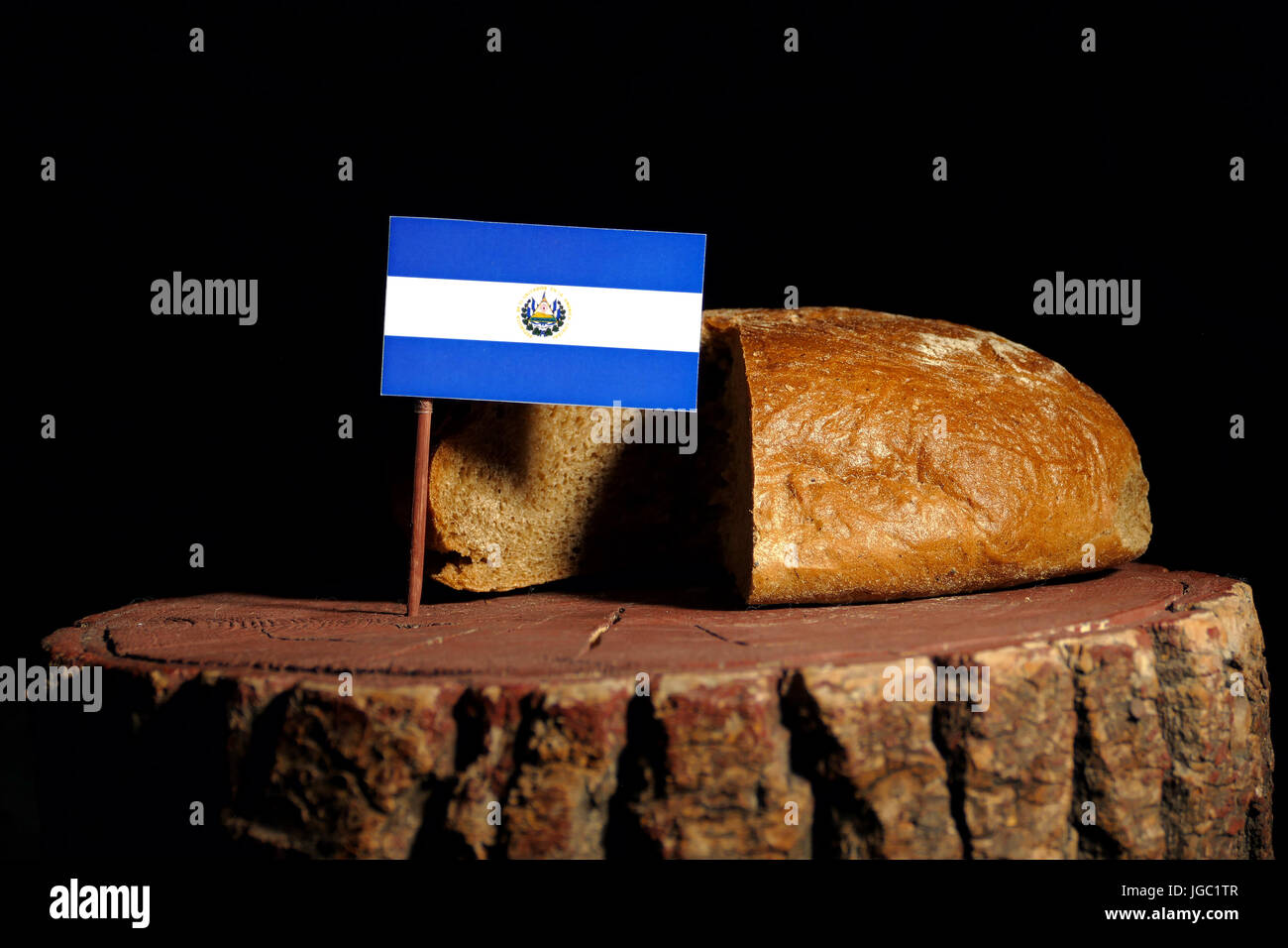 El Salvador flag on a stump with bread isolated Stock Photo