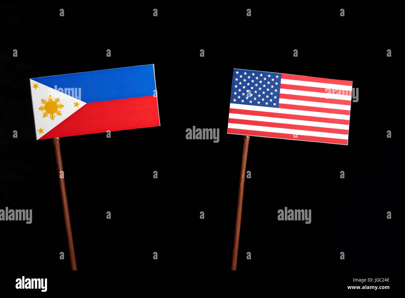 Philippines flag with USA flag isolated on black background Stock ...