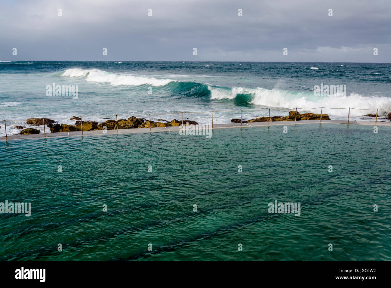 Swimming pool next to the ocean at Bronte Beach, Eastern suburbs, Sydney, NSW, Australia Stock