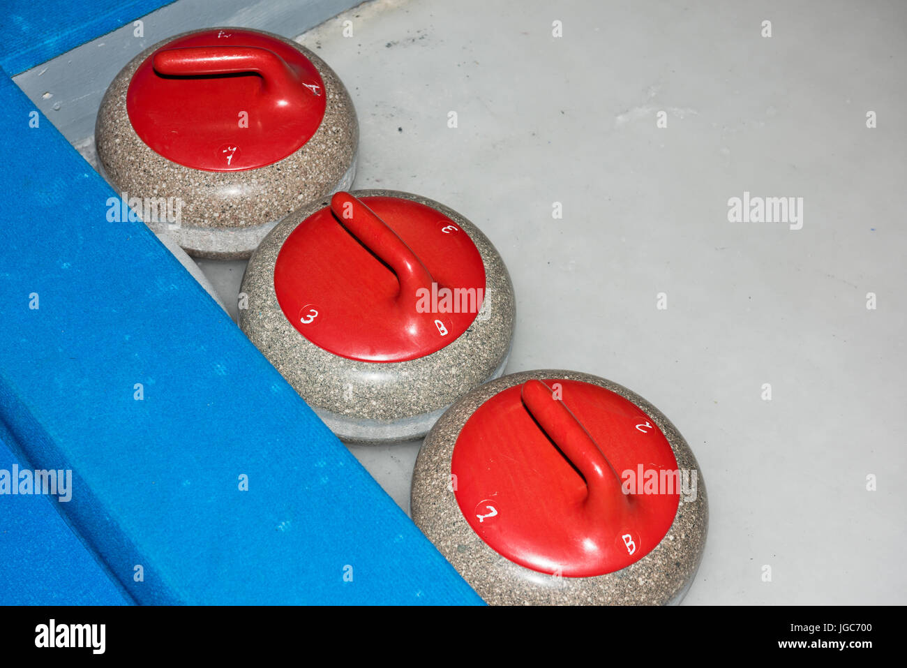 Equipment for curling sport game the ice Stock Photo Alamy