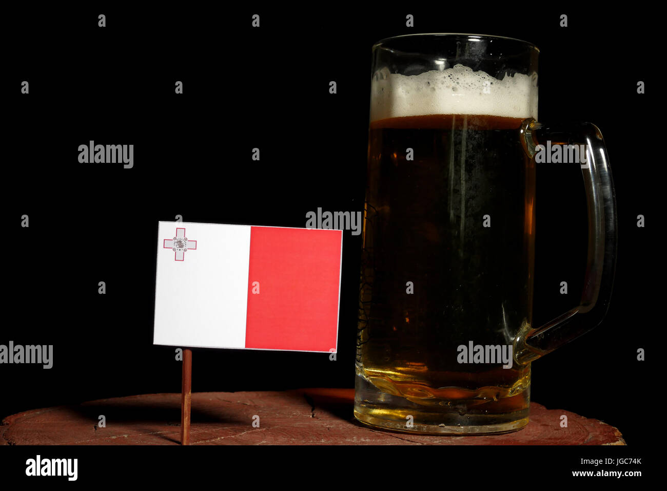Maltese flag with beer mug isolated on black background Stock Photo