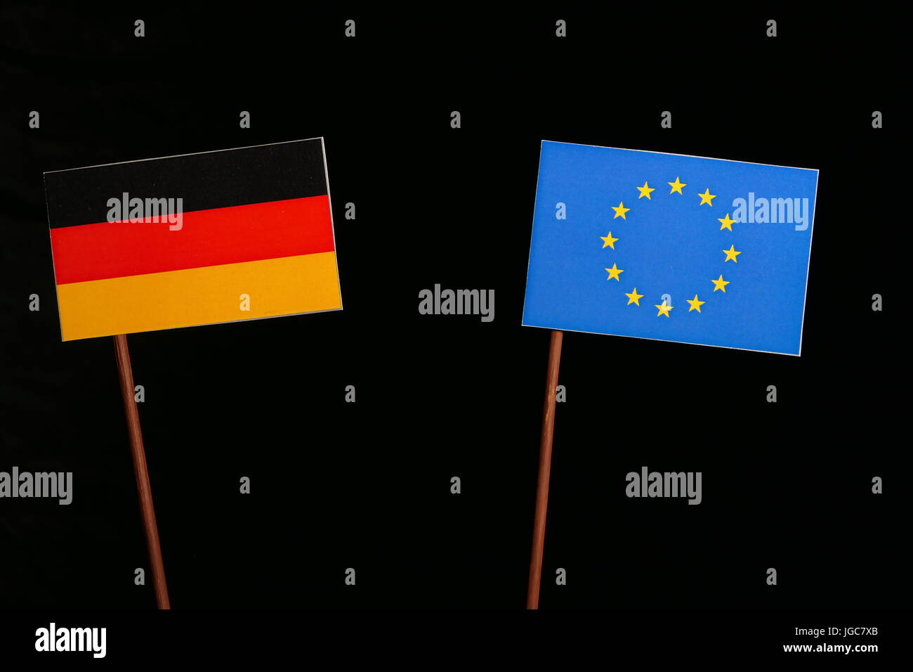 German flag with European Union (EU) flag isolated on black background ...