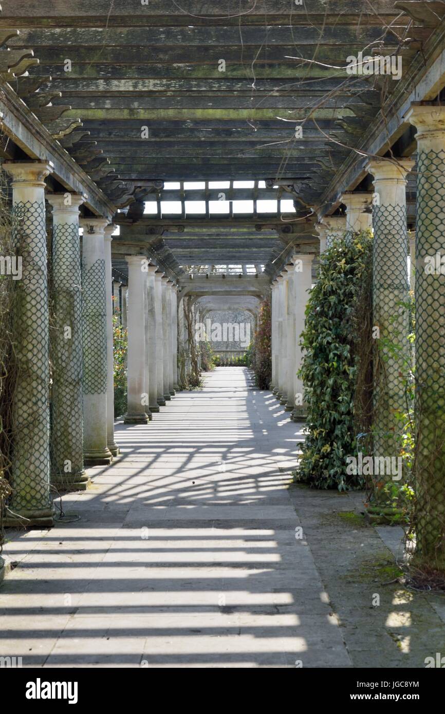 Wooden passage way in garden Stock Photo Alamy