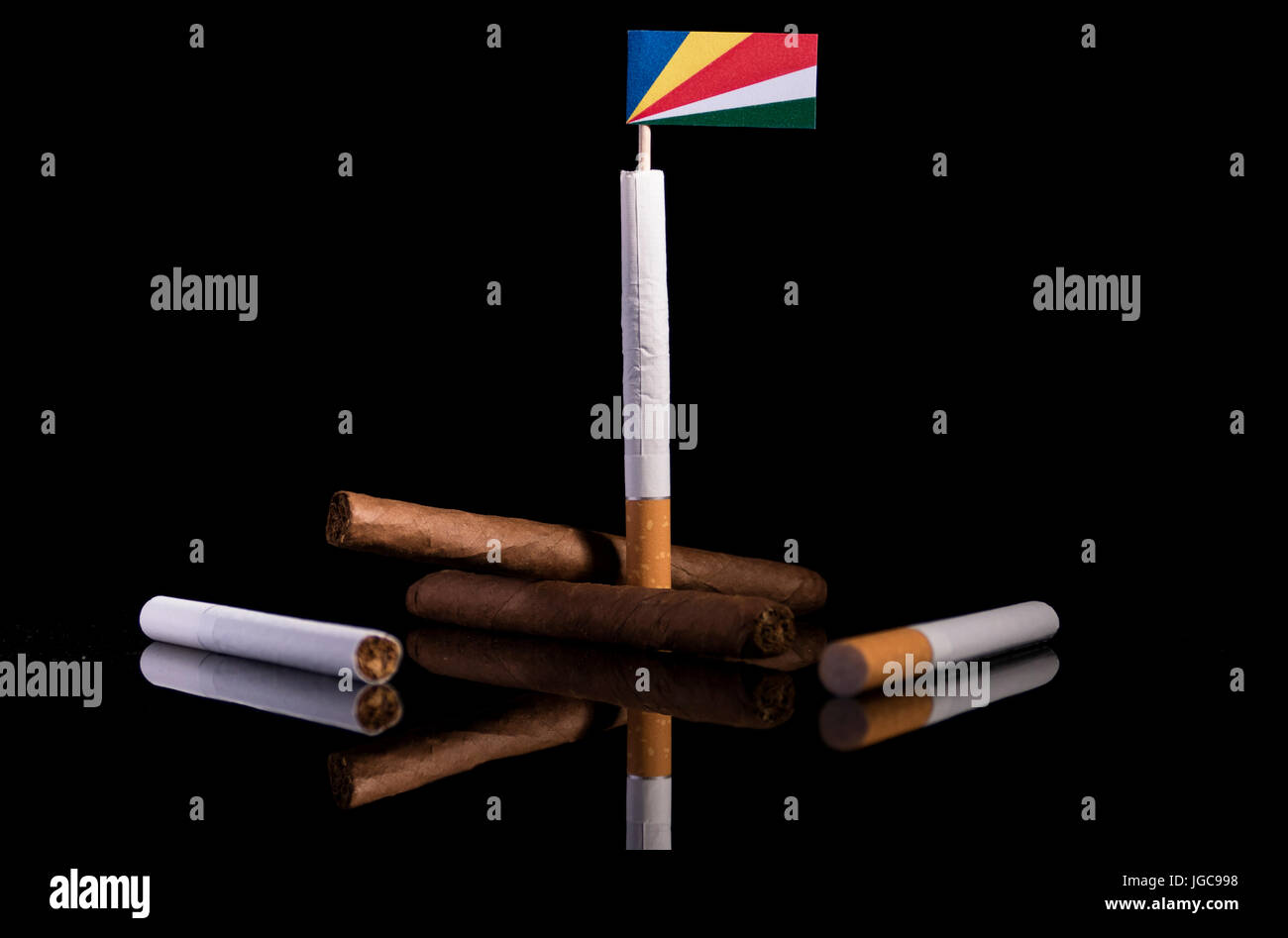 seychelles cigarettes Seychelles flag with cigarettes and cigars. Tobacco Industry concept Stock  Photo