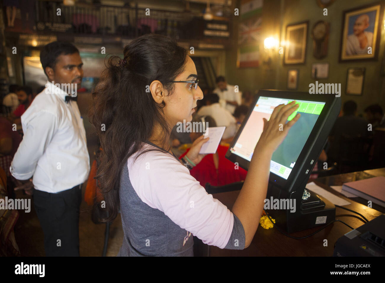 Mumbai, Maharashtra, India. 1st July, 2017. 1 July 2017 : Mumbai - INDIA.Diana Kohinoor Helps in the New GST billing system with Computer they had to buy to make GST compatible invoices.The new GST tax, designed to replace India's labyrinth of various levies found across the country's states with a uniform system and unite India into a single market, was launched by the country's prime minister Narendra Modi in a special session of parliament in New Delhi at the stroke of midnight 30 June 2017. Credit: Subhash Sharma/ZUMA Wire/Alamy Live News Stock Photo