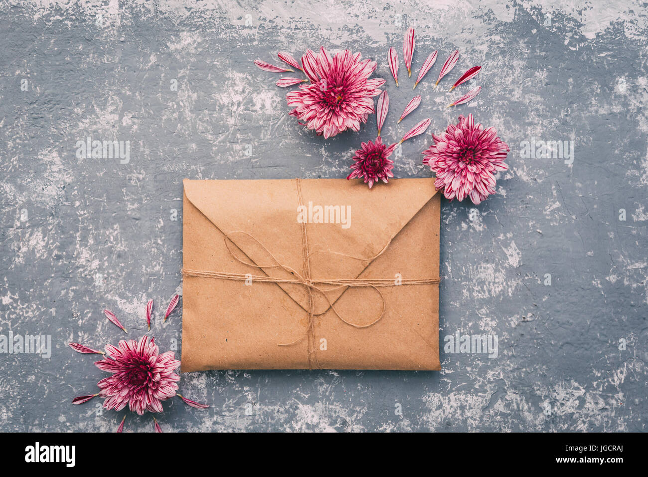 Brown envelope with flowers Stock Photo Alamy