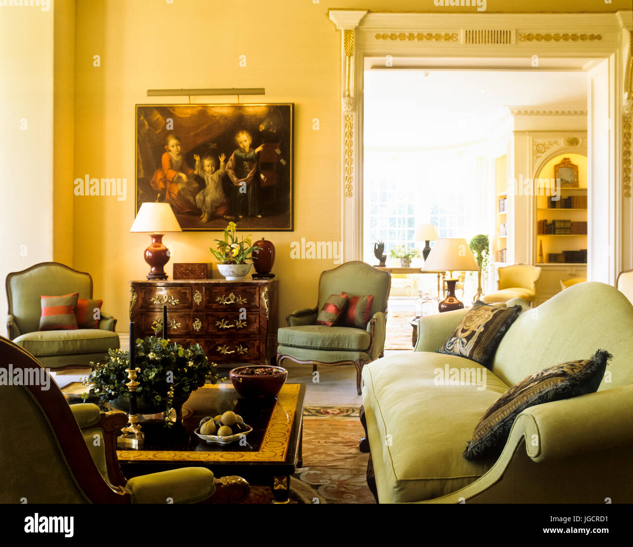 Edwardian living room with green seating Stock Photo