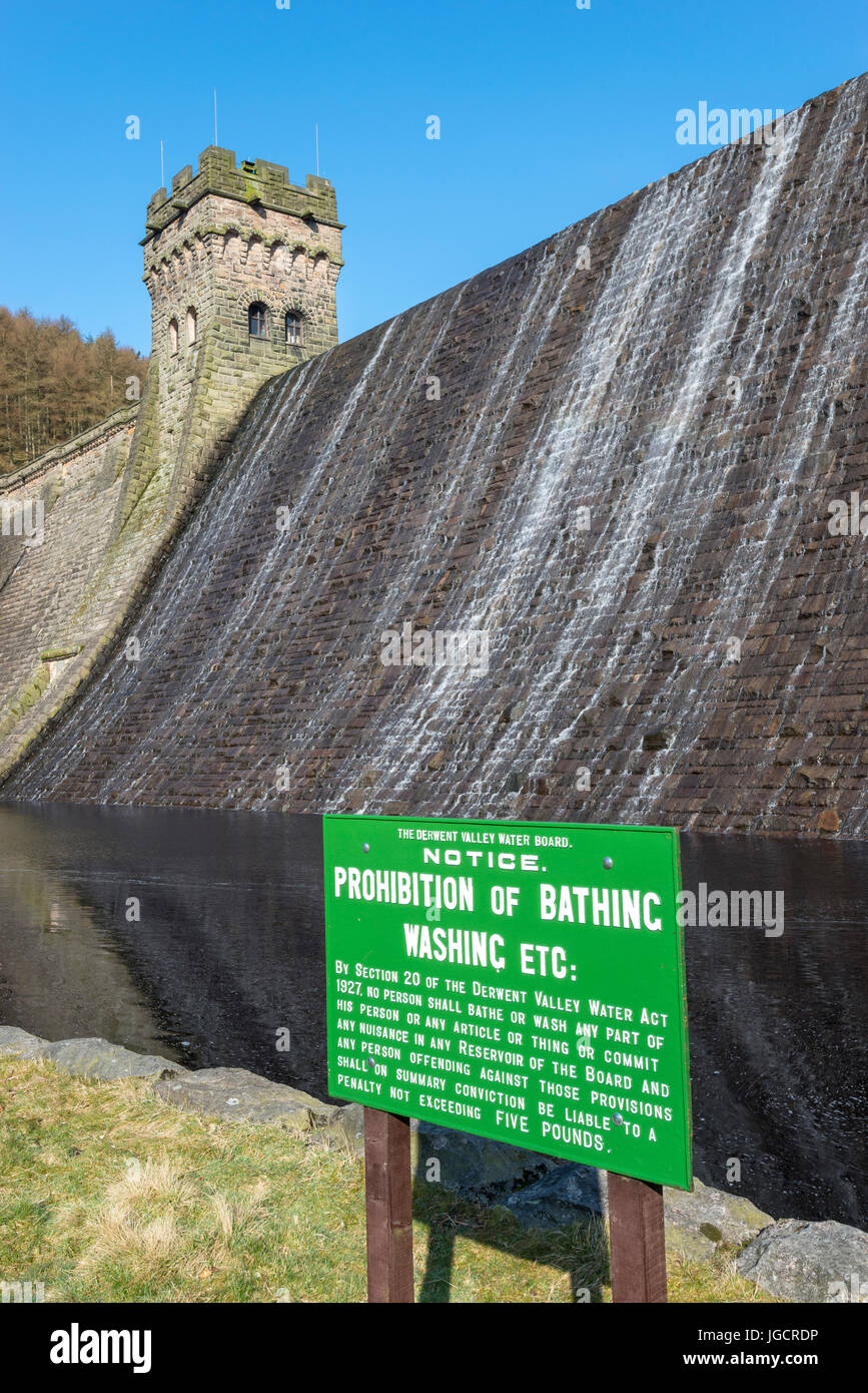 Old sign below the dam at Derwent reservoir in the Peak District, Derbyshire, England. Stock Photo