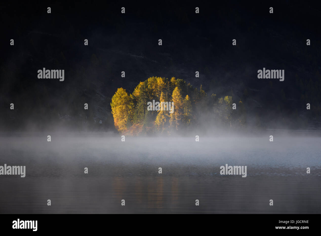 Lake sils in mist, Graubunden, Switzerland Stock Photo