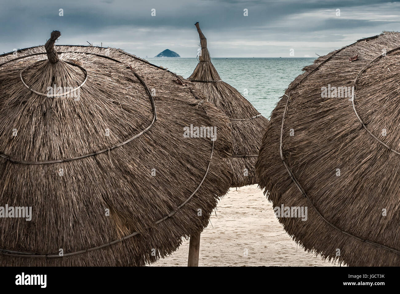 Close-up of parasols on beach, Na Trang Beach, Vietnam Stock Photo