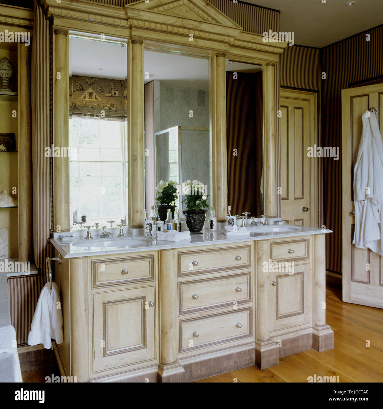 Mirrors above washbasin Stock Photo