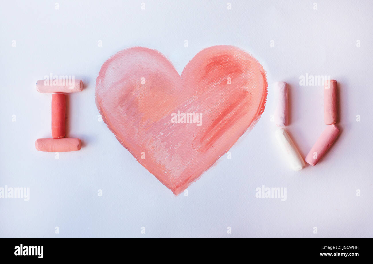I love you written with pink pastel sticks Stock Photo